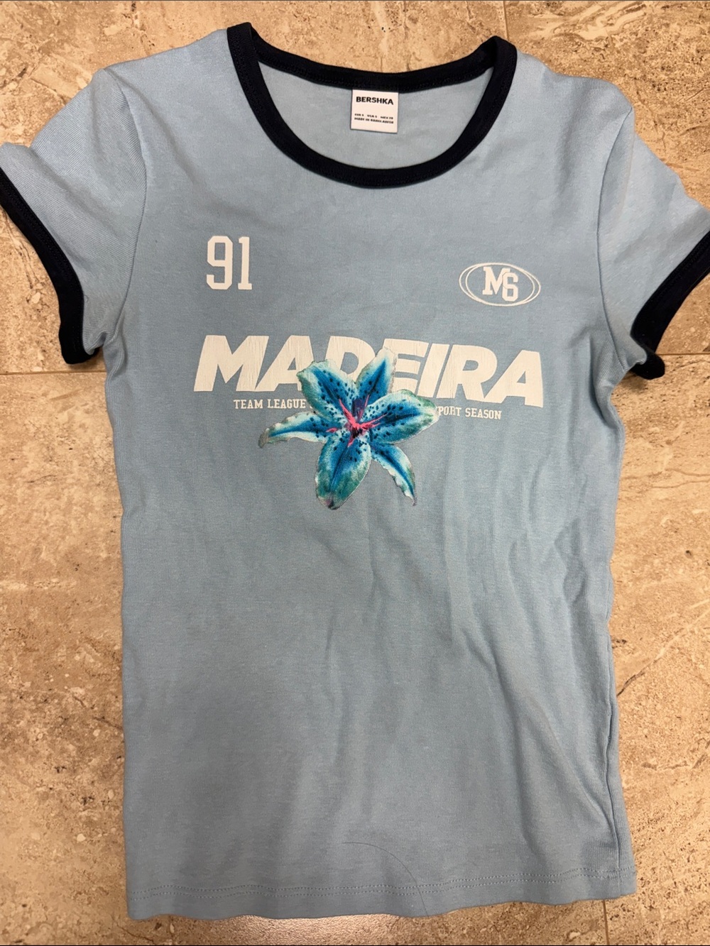 Bershka Light Blue Tee with Navy Trim and Floral Graphic
